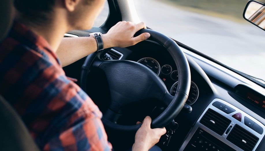 Person Driving a Car Person Driving a Car
